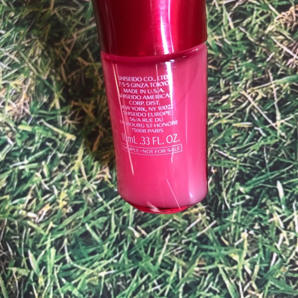Shiseido Ginza Tokyo Red Makeup Bag with .33 oz Ultimune Deluxe Sample Included